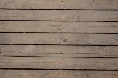 Ahşap Komiteler bir duvar içinde düzenlenmiş boyanmamış eski doku arka plan yakından