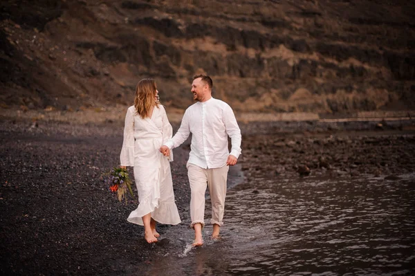 Lovely couple walking and laughing at each other