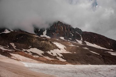View at the mountain covered in fog