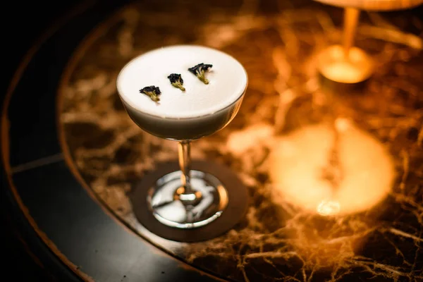 Close-up of alcohol drink on a marble table — 스톡 사진