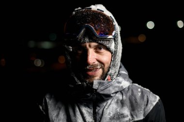 Portrait of male in winter sportswear and glasses