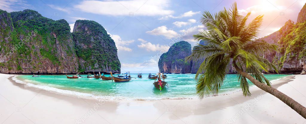 Panorama of Long boat and blue water at Maya bay in Phi Phi Island, Krabi Thailand.