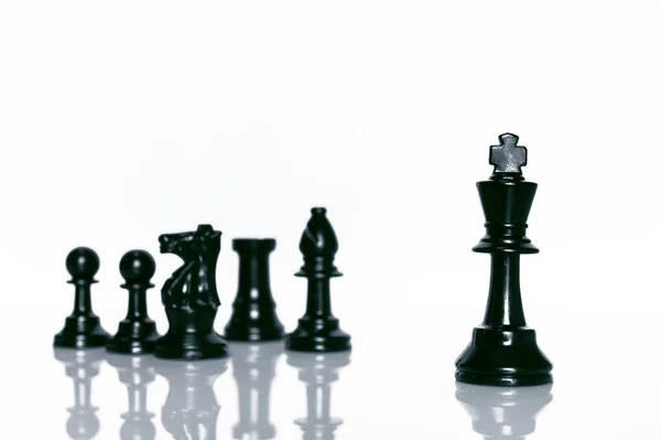 Black Chess on white background . Leader and teamwork concept for success. — Stock Photo, Image