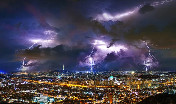 Thunderstorm clouds with lightning at night in Seoul, South Korea.