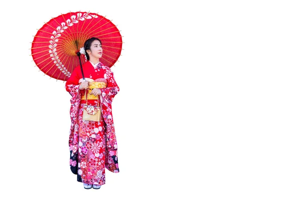 Asiatisk kvinna bär japansk traditionell kimono på vit bakgrund. — Stockfoto