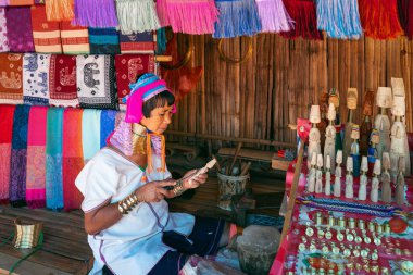 CHIANG RAI, THAILAND - FEB 14, 2020 : Long Neck Karen woman at hill tribe villages, Chiang Rai Province, Thailand.