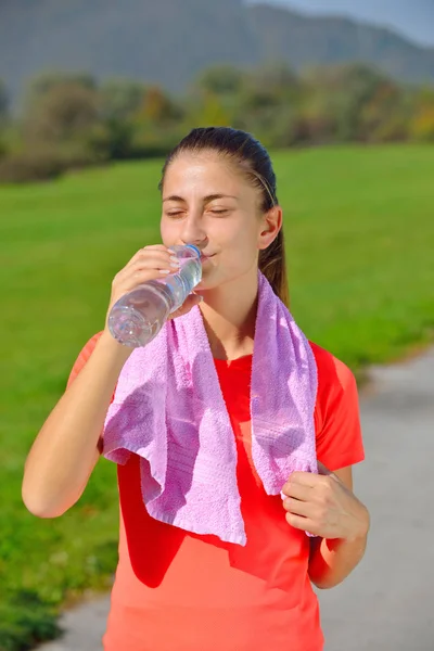 woman resting after morning run