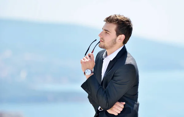 Young man in casual suit