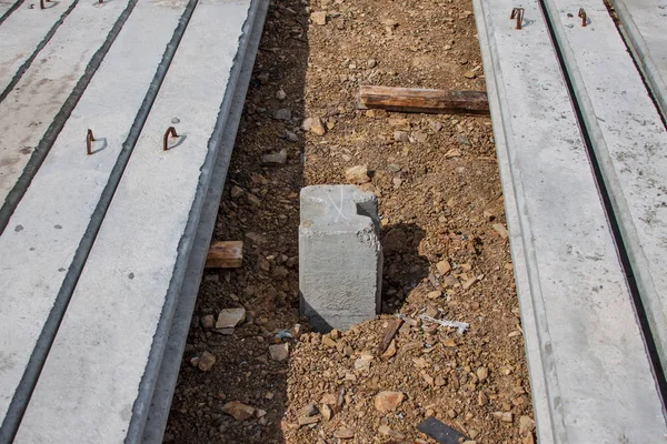 Concrete stake, finished concrete pilings