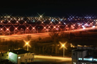 night, city lights, illuminated road
