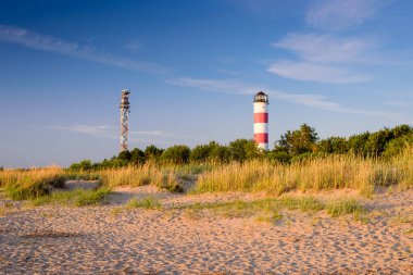 Lighthouse in Narva-Joesuu, Estonia. Narva-Joesuu - seaside resort and popular holiday destination by Baltic sea in Estonia clipart