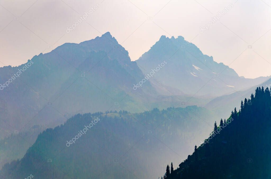 mountain landscape with fog and clouds