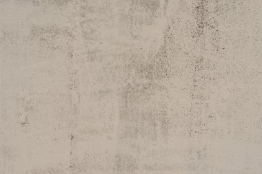 Çizik ve çatlaklarla dolu bir duvar parçası.