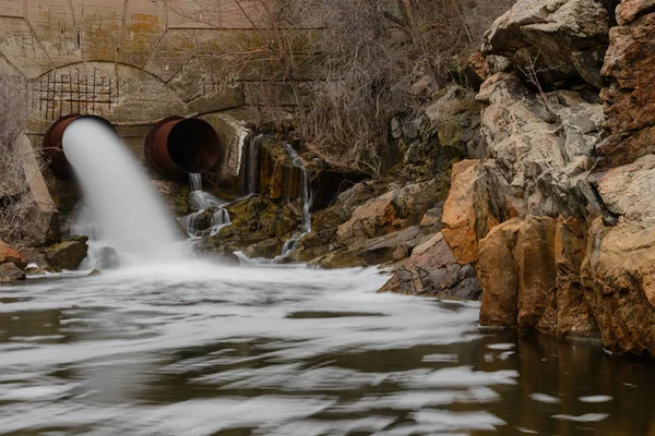 Dumping of water on a river dam