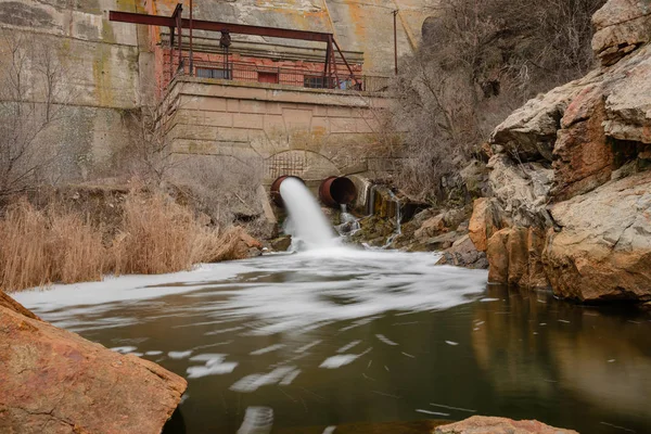 Dumping of water on a river dam