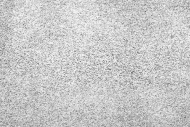 Çizik ve çatlaklarla dolu bir duvar parçası.