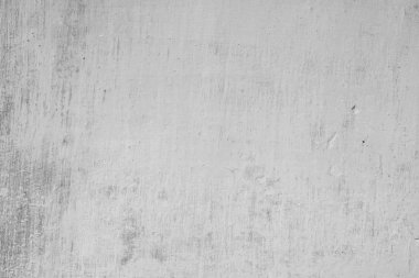 Çizik ve çatlaklarla dolu bir duvar parçası.