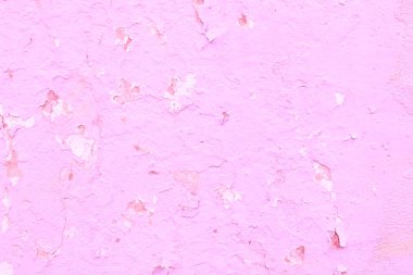 Çizik ve çatlaklarla dolu bir duvar parçası.