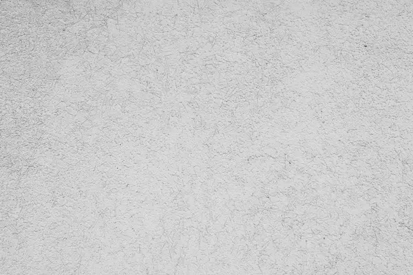 Çizik ve çatlaklarla dolu bir duvar parçası.