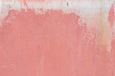 Çizik ve çatlaklarla dolu bir duvar parçası.