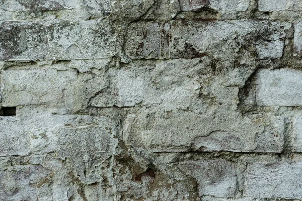 Textura de ladrillo con arañazos y grietas — Foto de Stock