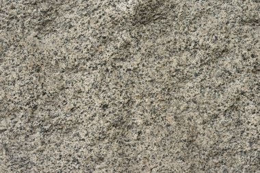 Çizik ve çatlaklarla dolu bir duvar parçası.