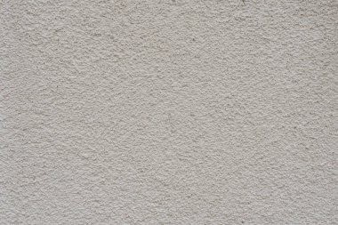 Çizik ve çatlaklarla dolu bir duvar parçası.