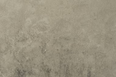 Çizik ve çatlaklarla dolu bir duvar parçası.