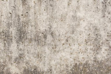 Çizik ve çatlaklarla dolu bir duvar parçası.