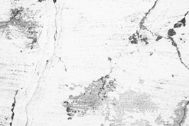 Çatlakları ve çizikleri olan beton bir duvarın dokusu arka plan olarak kullanılabilir.
