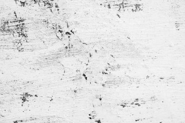 Çatlakları ve çizikleri olan beton bir duvarın dokusu arka plan olarak kullanılabilir.