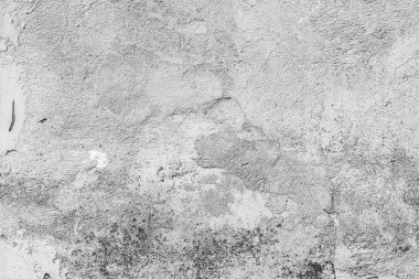 Çatlakları ve çizikleri olan beton bir duvarın dokusu arka plan olarak kullanılabilir.