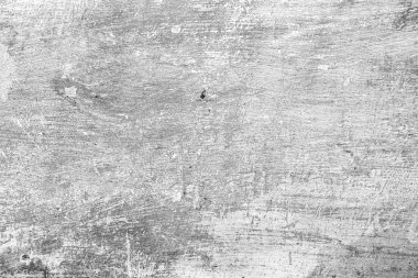 Çatlakları ve çizikleri olan beton bir duvarın dokusu arka plan olarak kullanılabilir.