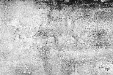 Çatlakları ve çizikleri olan beton bir duvarın dokusu arka plan olarak kullanılabilir.