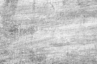 Çatlakları ve çizikleri olan beton bir duvarın dokusu arka plan olarak kullanılabilir.