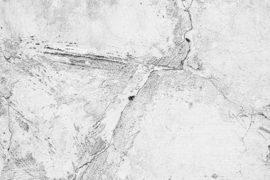 Çatlakları ve çizikleri olan beton bir duvarın dokusu arka plan olarak kullanılabilir.