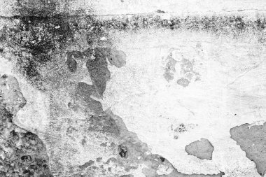 Çatlakları ve çizikleri olan beton bir duvarın dokusu arka plan olarak kullanılabilir.