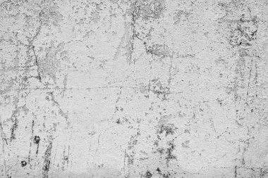 Çatlakları ve çizikleri olan beton bir duvarın dokusu arka plan olarak kullanılabilir.