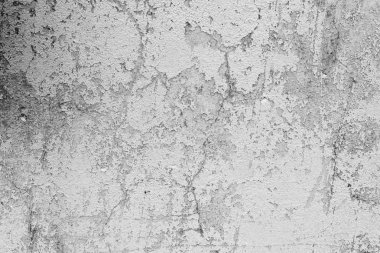 Çatlakları ve çizikleri olan beton bir duvarın dokusu arka plan olarak kullanılabilir.