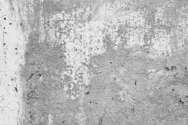 Çatlakları ve çizikleri olan beton bir duvarın dokusu arka plan olarak kullanılabilir.