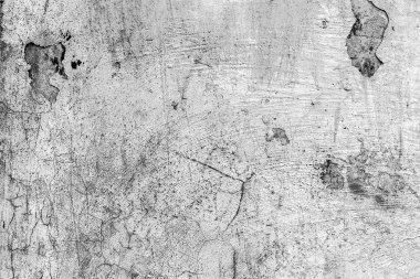 Çatlakları ve çizikleri olan beton bir duvarın dokusu arka plan olarak kullanılabilir.