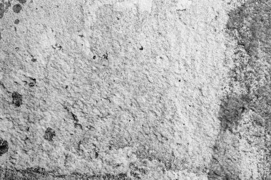 Çatlakları ve çizikleri olan beton bir duvarın dokusu arka plan olarak kullanılabilir.