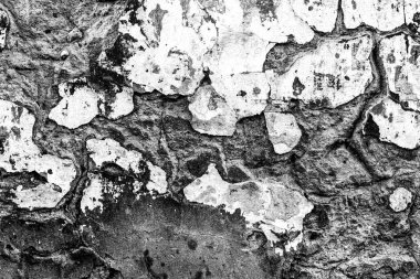 Çatlakları ve çizikleri olan beton bir duvarın dokusu arka plan olarak kullanılabilir.