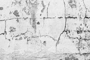 Çatlakları ve çizikleri olan beton bir duvarın dokusu arka plan olarak kullanılabilir.