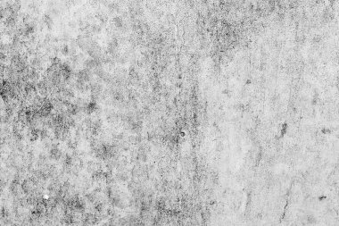 Çatlakları ve çizikleri olan beton bir duvarın dokusu arka plan olarak kullanılabilir.