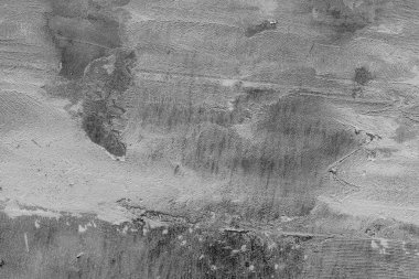 Çatlakları ve çizikleri olan beton bir duvarın dokusu arka plan olarak kullanılabilir.