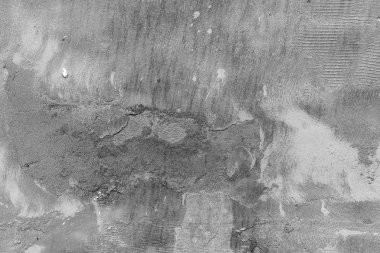 Çatlakları ve çizikleri olan beton bir duvarın dokusu arka plan olarak kullanılabilir.