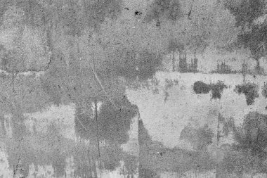 Çatlakları ve çizikleri olan beton bir duvarın dokusu arka plan olarak kullanılabilir.