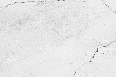 Çatlakları ve çizikleri olan beton bir duvarın dokusu arka plan olarak kullanılabilir.