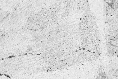 Çatlakları ve çizikleri olan beton bir duvarın dokusu arka plan olarak kullanılabilir.